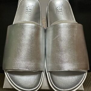 New, size 9 Franco Sarto silver slides